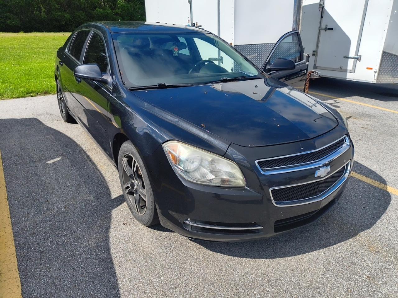 Chevrolet Malibu with damage purchased in the Valley
